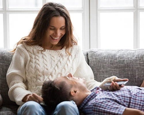 Healthy Couple Relaxing on Couch