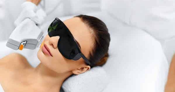 A woman at the spa getting laser hair removal treatment