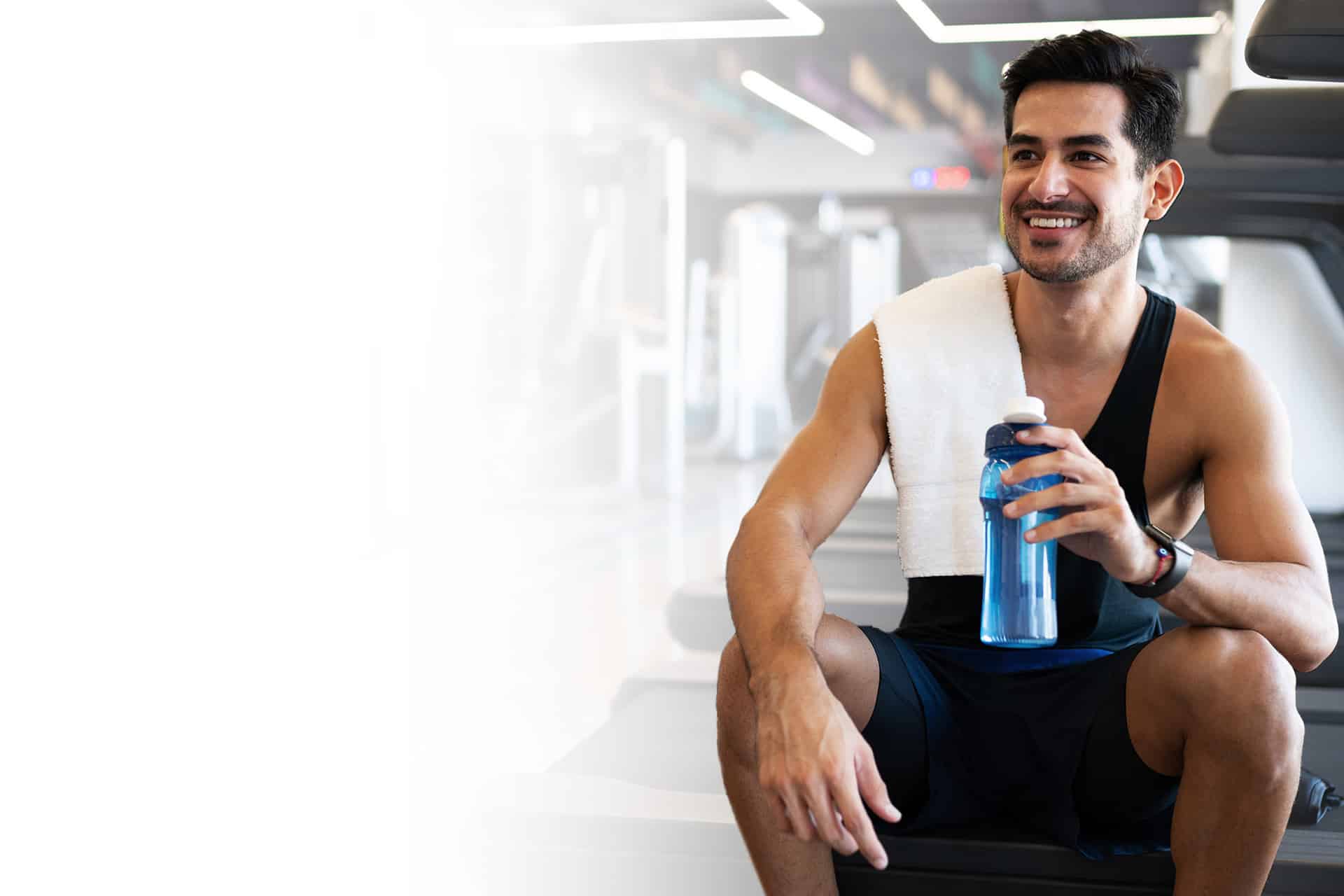 A man sitting at the gym